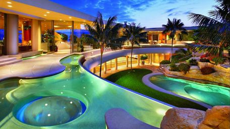 Swimming pools and palms wallpaper