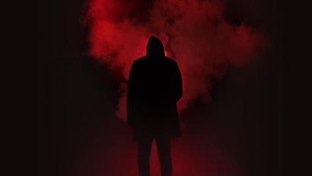 Man silhouette in the dark wallpaper