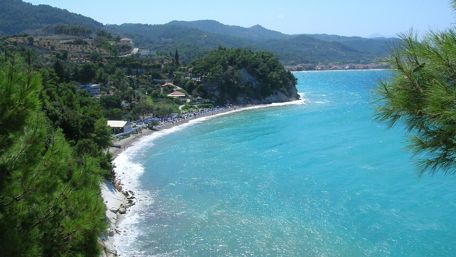 Greek beach with azure blue sea wallpaper