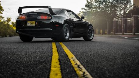 Toyota Supra Sports Car on Sunrise Road wallpaper