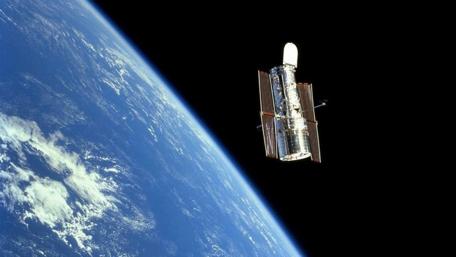 Hubble Space Telescope and the Earth wallpaper