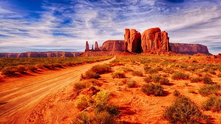 Dirt road in Monument Valley - Navajo Tribal Park wallpaper