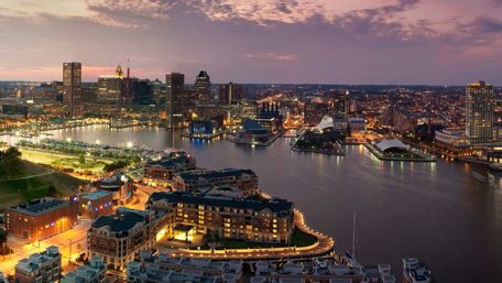 Serene Evening Over Baltimore's Inner Harbor View wallpaper