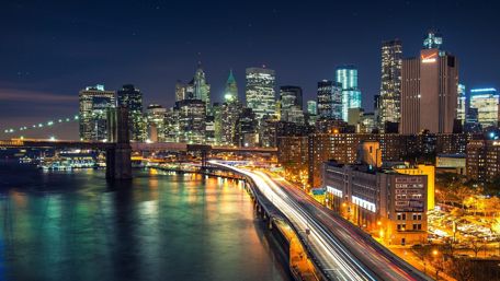 New York city lights at night from the East River wallpaper