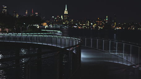 City Lights Reflected in Water at Night wallpaper