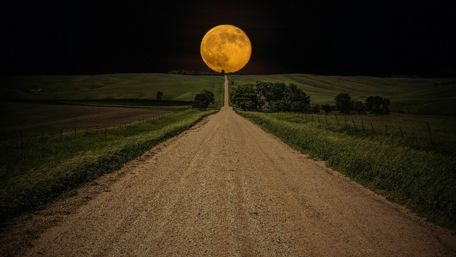 Supermoon over the dirt road wallpaper