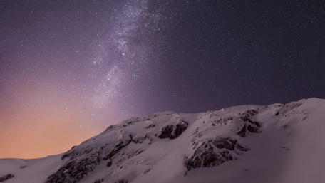 Milky way above the mountain ridge wallpaper