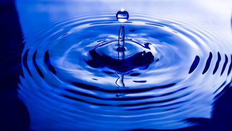 Rippling blue water wallpaper