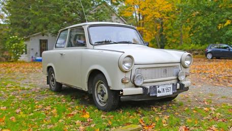 Old Trabant in the garden wallpaper