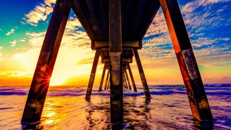 Sunset from under the pier wallpaper