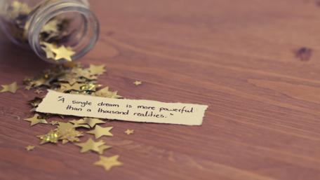 "A single dream is more powerful than a thousand realities" wallpaper