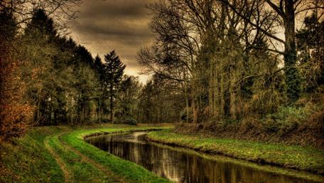 Dark clouds above the canal wallpaper