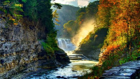 River cascade in the fall forest wallpaper