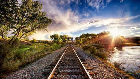 Sunshine above the railway line wallpaper