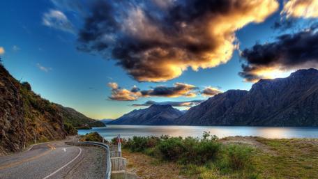Road along the mountain lake wallpaper