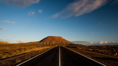 Endless road along the highland wallpaper