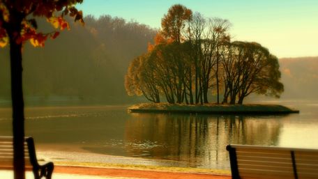 Serene Islet Reflections in Autumn Light wallpaper