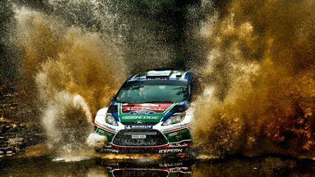 Ford Fiesta Rallycross Splashing Through Mud wallpaper