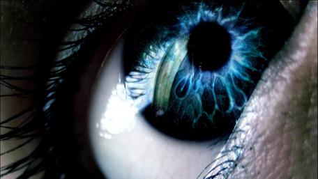 Mystical Eye Revealing Hidden Depths of Existence wallpaper