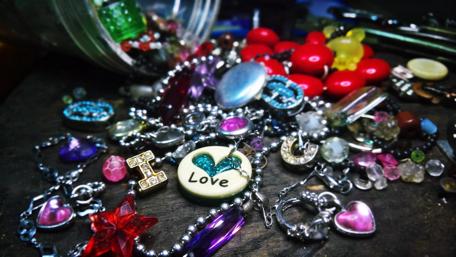 Colorful Jewelry and Heart Pendants Showcase wallpaper