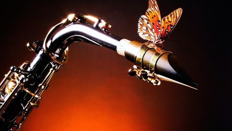 Saxophone with butterfly wallpaper