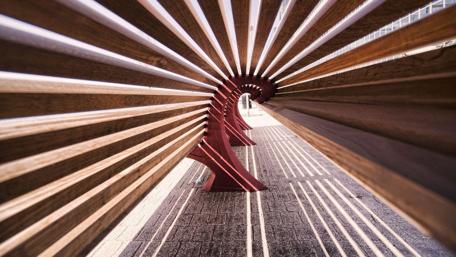 Intricate Wooden Structure Capturing Light and Symmetry wallpaper