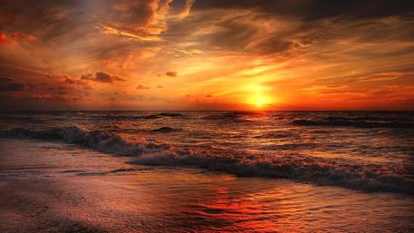 Glorious red and orange sunset at the North Sea wallpaper