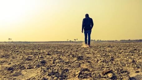 Man walking in a desert wallpaper