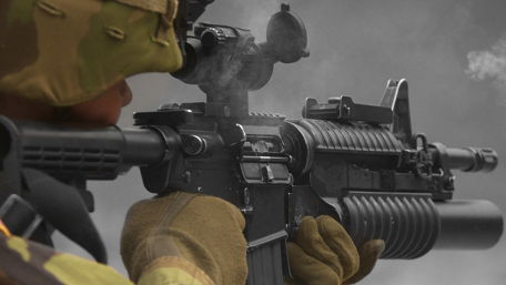 Soldier in Action with Tactical Gear wallpaper