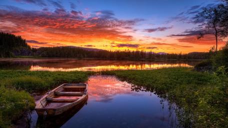 Lonely boat on the river wallpaper