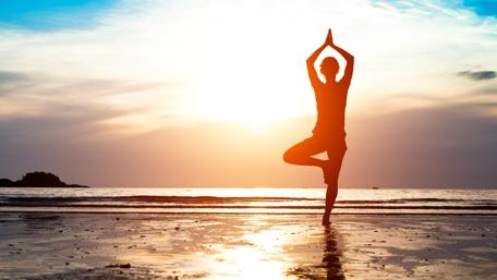 Yoga on the seashore wallpaper