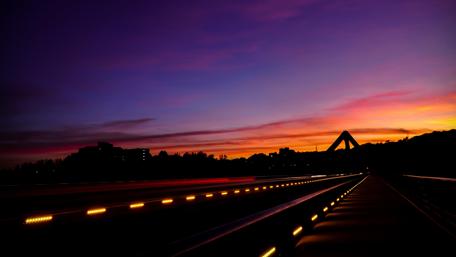 Long highway in the sunset wallpaper