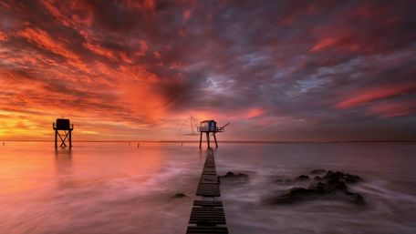 Long pier inthe sunset wallpaper