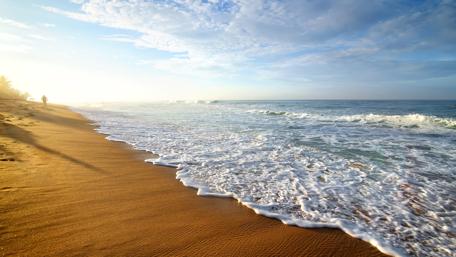 Beach with patterned sand wallpaper
