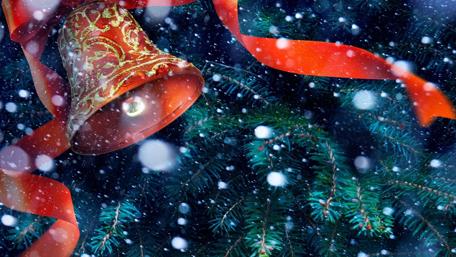 Red ribbons and a Christmas bell wallpaper