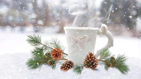 Hot coffee steam in the snowfall wallpaper