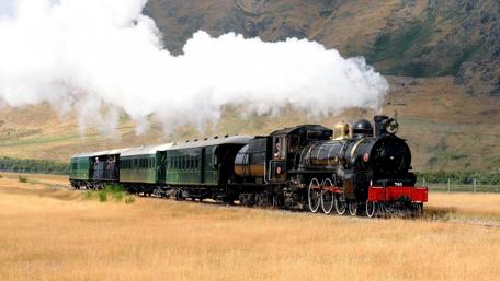 Steam locomotive in the field wallpaper