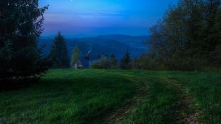 Serene Dawn Over the Highland Meadow wallpaper