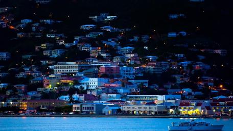 Enchanting Night Cityscape Over Water wallpaper