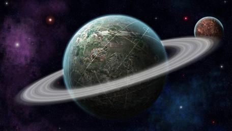 Majestic Planet with Enigmatic Rings and Moons wallpaper