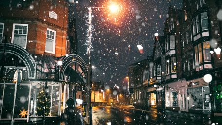 Snowfall in a town wallpaper