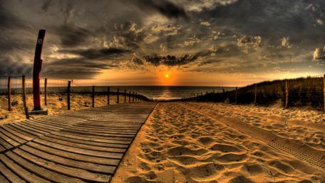 Wooden walkway on the beach wallpaper