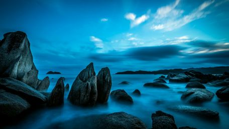 Tranquil Blue Dawn by the Sea wallpaper