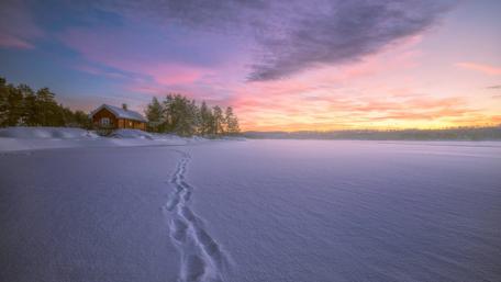 Snowy frozen lake in the sunset wallpaper