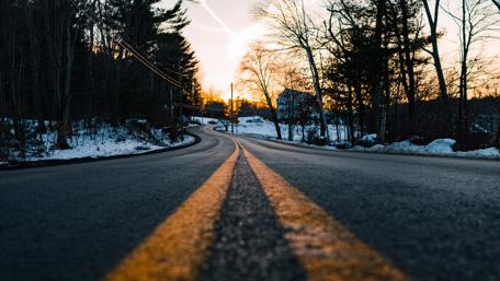 Road with snowy trees wallpaper
