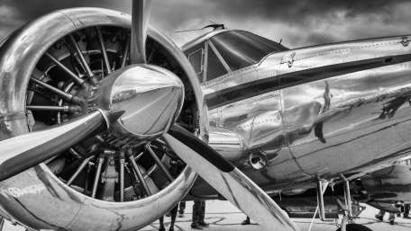 Iconic Aircraft Under Cloudy Skies wallpaper