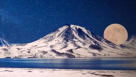 Full moon over the snowy mountain wallpaper