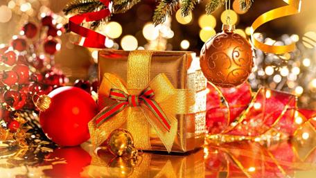 Festive Christmas Cheer Filled with Gold and Ornaments wallpaper