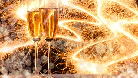 Cheers to a Sparkling New Year Celebration Togetherness and Joy wallpaper