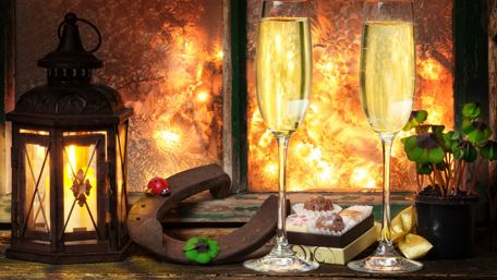 New Year Celebration with Toasting Champagne and Lanterns wallpaper